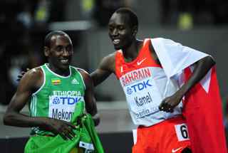 FRANCK FIFE/AFP/Getty Images. Bahrain's Yusuf Saad Kamel (R) and Ethiopia's Deresse Mekonnen celebrate after the men's 1500m final race of the 2009 IAAF Athletics World Championships in Berlin.