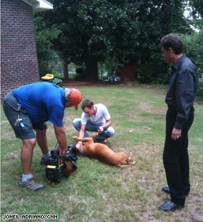 David Mattingly talks to Tyler Edmonds, who adopted his dog from an animal shelter.
