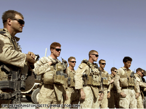 U.S. Marines listen to a brief before heading out on patrol in Helmand Province.