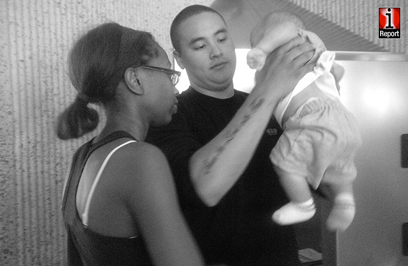 Crystal Ogo and her husband Private First Class Kevin Ogo and their son Noah.