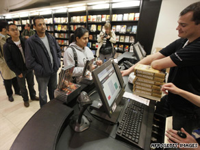 Fans line up for copies of new Dan Brown thriller.