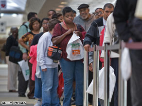 People seeking employment line up outside a job fair in Baltimore, Maryland.