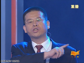 Zhou Yu defends himself during the 'lightening round' of the Win In China competition.