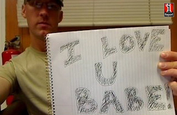 Michelle Doyen salutes her husband SGT Steven Doyen of the Army Reserves.