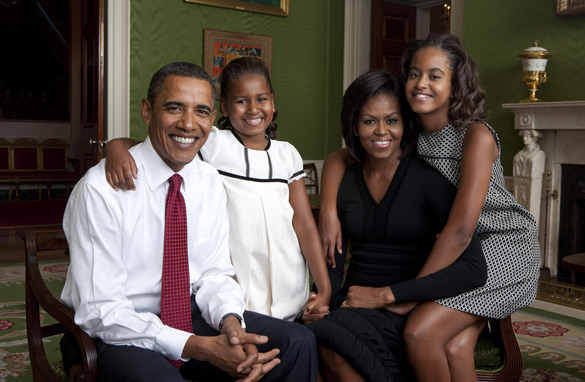 President Barack Obama, First Lady Michelle Obama, and their daughters, Sasha and Malia, sit for a family portrait in the Green Room of the White House, Sept. 1, 2009. (Official White House Photo)