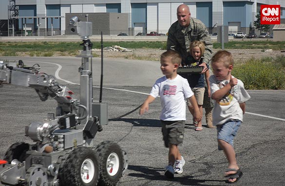 Navy Senior Airman Benjamin Frank and his children.