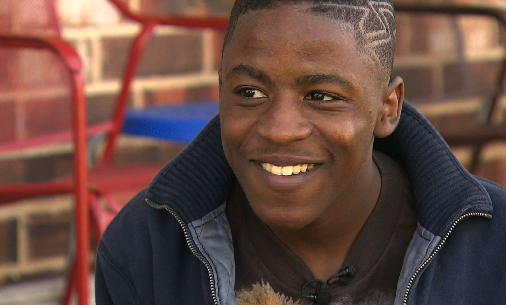 Charles Evans, now a teenager, back in the Ninth Ward.