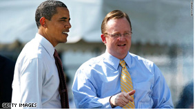 President Obama and spokesman Robert Gibbs talk at a White House event in June.