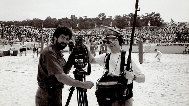 Mark Biello and Chris Hrubesh cover a volleyball tournament in this CNN photo from 1995.