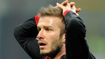 Beckham vows to return to pitch