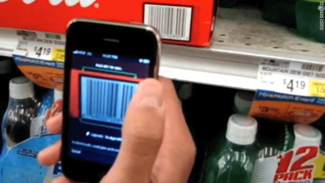The RedLaser app, shown here in a promotional YouTube video, lets users scan products and search for better deals.