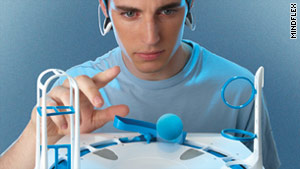Mindflex players must use brain signals to manipulate balls.