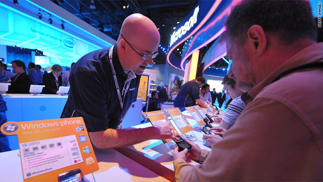 A Microsoft representative shows off the Windows smartphone to attendees at the 2010 CES show in January .