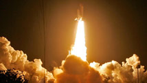 Crew inspects shuttle after launch