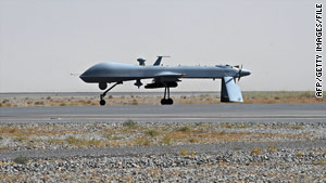 A U.S. Predator unmanned drone is on the tarmac of a military airport in Kandahar, Afghanistan, in June.