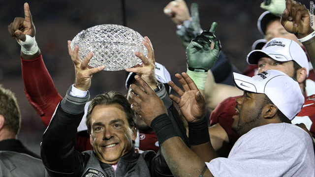 The Alabama Crimson Tide celebrate with the BCS Championship trophy.