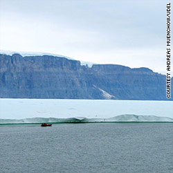Huge ice island breaks away from Greenland glacier
