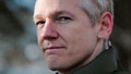 Assange condemns investigations