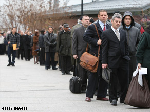 Employment seekers line up to get into a job fair in New York.
