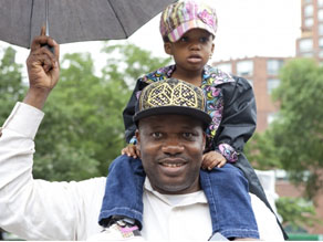 Jean Montrevil and the youngest of his four children, Jamya.
