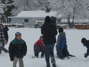 Kids play outside at the ranch.