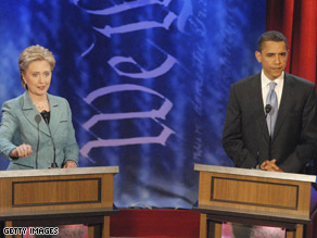 (FILE PHOTO) Clinton and Obama during the April 2008 debate in Philadelphia.