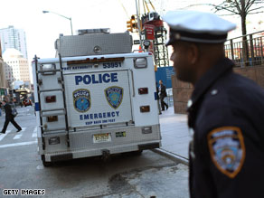 New York City police officers guard lower Manhattan, near Ground Zero.