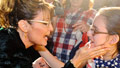 Palin palm message mocks critics