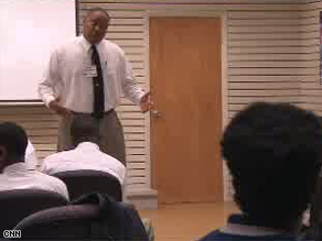 Kyle Anderson speaks to a group of young men who are part of the Greater Hartford Male Youth Leadership Program.