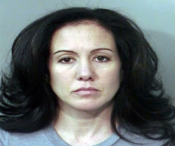 Outrage: Mom of 4 behind bars for     allegedly hiring hitman to kill hubby