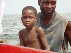 A child slave with his owner.<br />
Photo credit: Benjamin Goode' border='0'  width='292' height='219' />
<div class=