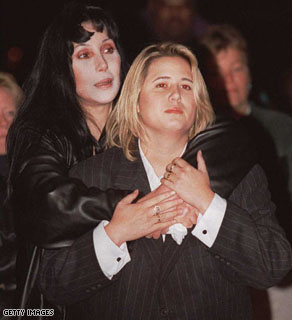 Actress and singer Cher comforts her daughter Chastity Bono during a rally for 'National Coming Out Day' in 1996. Chastity started the transition to Chaz about 1 year ago.