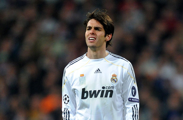 Kaka looks glum after French side Lyon dump Real Madrid out of the European Champions League.