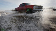Severe weather Red River crests in Fargo bringing floods as officials watch levees