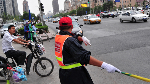 Confronting traffic in Beijing: Get ready for a crowd.