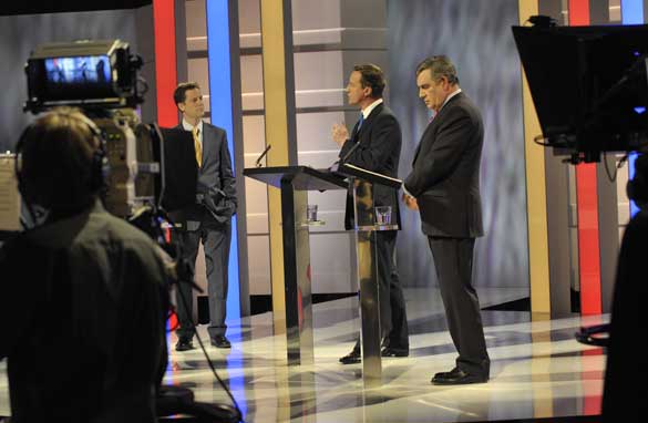 Nick Clegg (left), David Cameron (center) and Gordon Brown (right) made UK election history Thursday (Getty).