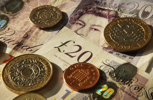 Piles Of British Money. Market watchers are keen to