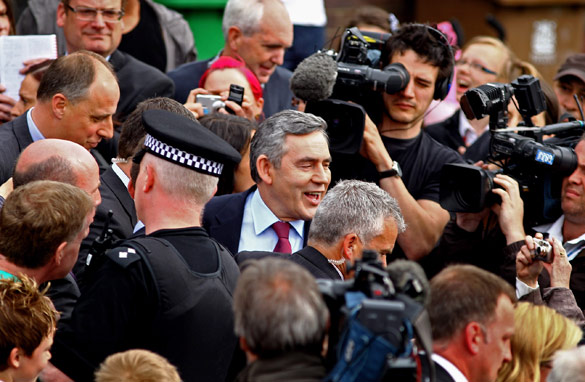 UK Labour Party leader Gordon Brown is mobbed by the media after personally apologizing to Gillian Duffy (Getty).