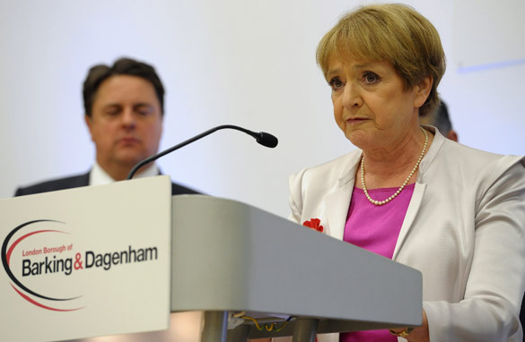BNP leader Nick Griffin looks on as Margaret Hodge delivers her victory speech. (Getty Images)