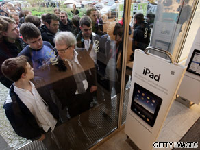 Shoppers wait to purchase their new iPad.