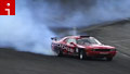 Smoke and squealing tires of drift racing