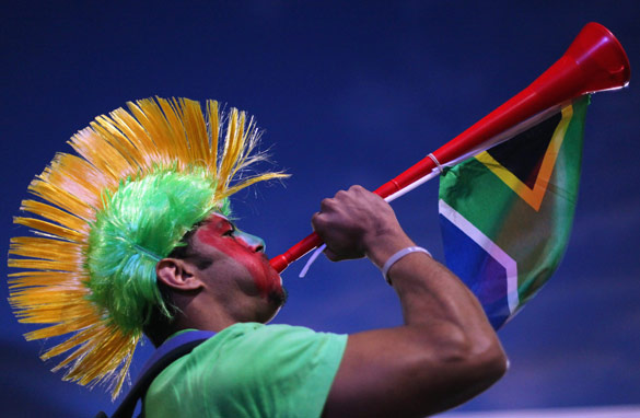 A South Africa supporter blows a vuvuzela at a fan park in Cape Town. Getty Images