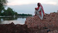 Women riskily visible in Pakistan's floods