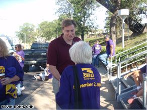 Rep. Jason Altmire shakes hands during the Pittsburgh Labor Day Parade.