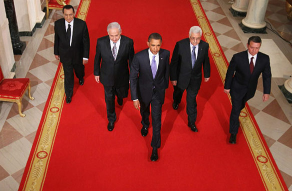 The original photo showed U.S. President Barack Obama leading Middle East leaders during peace talks.