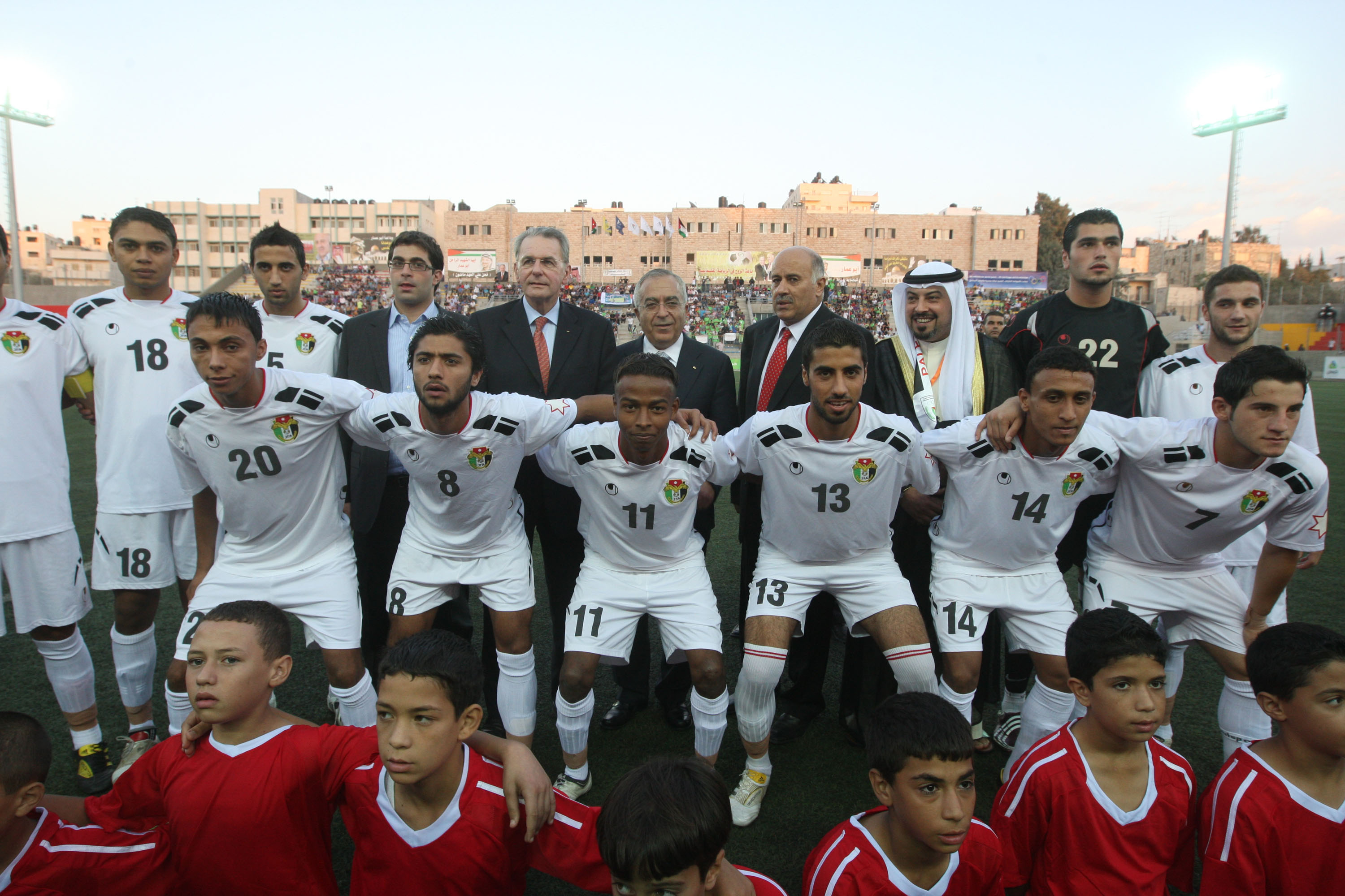 IOC Chief Jacques Rogge and Palestinian Authority Prime Minister Salam Fayyad at West Bank football match (Mustafa Abu Dayeh/Palestinian Authority PM Office)