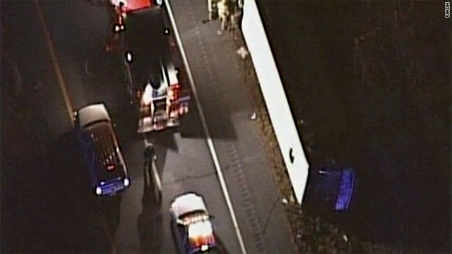 30 hurt when bus rolls over on highway