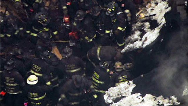 Two firefighters dead, 14 injured after roof collapse