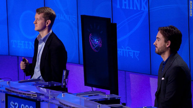 "Jeopardy!" champs Ken Jennings, left, and Brad Rutter match wits with IBM's computer Watson on the popular game show.