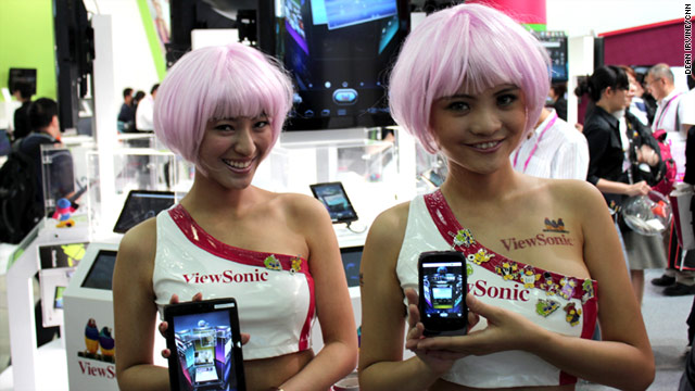 Computex showgirls advertise the products on offer at the fair